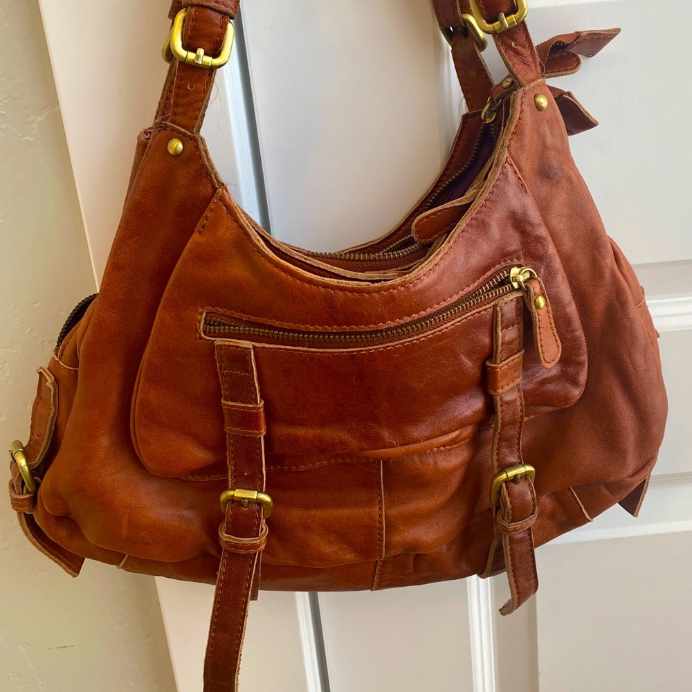 Brown leather bag from Anthropologie.